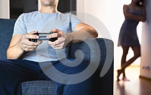 Couple having problem with video games. Girlfriend jealous of technology. Distant marriage, divorce. Unhappy lonely wife.