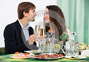 Couple having romantic dinner in home