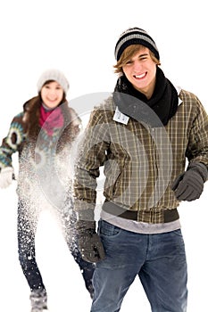 Couple having snowball fight