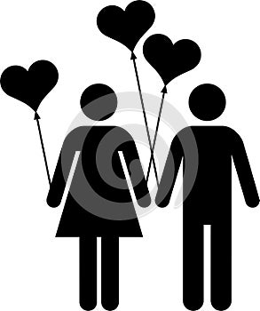 Couple with heart-shaped balloons photo