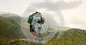 Couple, high five and hiking on mountains for success, support and travel achievement or goals in nature. Happy people