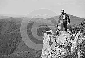 Couple hikers enjoy view. Hiking peaceful moment. Tourist hiker girl and man relaxing. Hiking benefits. Hiking weekend