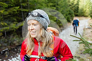 Couple hikers hiking in forest