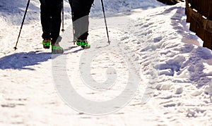 Couple of hikers walking with crampons