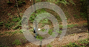 Couple of Hikers Walking in Forest High Angle View