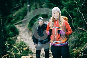 Couple hikers walking hiking