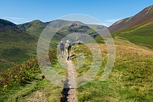 Couple hiking in the Lake District. photo