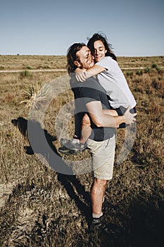 Couple hiking together in the wilderness