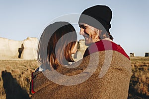 Couple hiking together in the wilderness