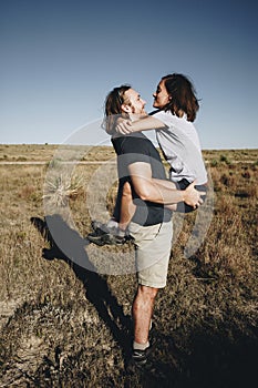 Couple hiking together in the wilderness