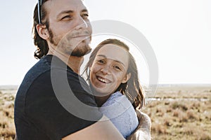 Couple hiking together in the wilderness