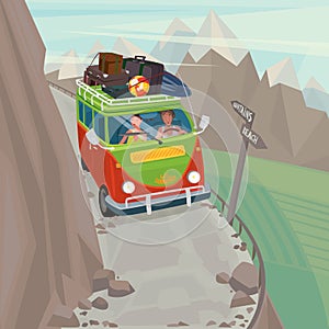 Couple in a hippie bus rides on the mountain serpentine