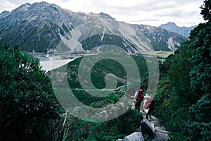 A Couple Hking with Beautiful scene green nature over the Mt Cook National park (Muller's hut track) I