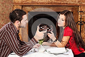 Couple holding glasses of wine