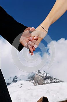 Couple holding hands