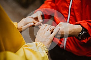 Couple holding hands. hand with engagement ring. Couple in love. Love concept.