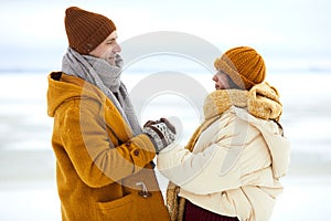 Couple Holding Hands in Winter