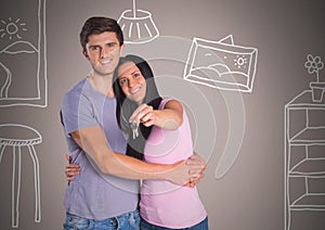 Couple Holding key with home room drawings in front of vignette