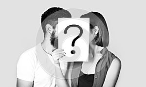 Couple holding paper question mark. Anonymous, man and woman question. Kiss couple, incognita. Problems and solutions