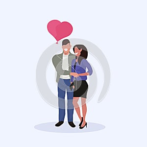 Couple holding pink heart shape balloon happy valentines day holiday celebration concept man woman lovers standing