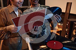 Couple holding vnyl records