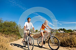 Couple in holidays cycling