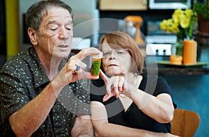 Couple at Home with Medication