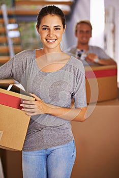 Couple, home and smile with boxes for moving in new house for ownership, property and pack furniture. Apartment