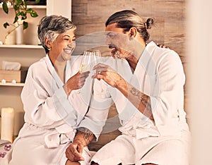 Couple, hotel and wine glasses for toast in massage, vacation or holiday celebration, love and romance. Champagne