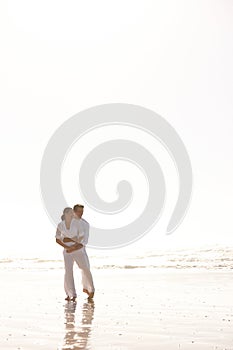 Couple, hug and beach with love, vacation or summer holiday together for embrace or outdoor romance. Man and woman