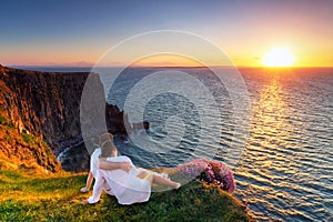 Couple in hug watching sunset