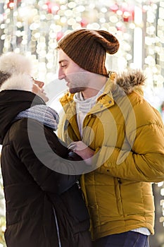 Couple hugging on romantic walk