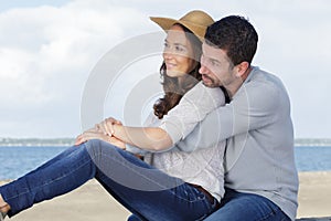 Couple hugging sea view