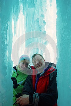 Couple in ice grotto