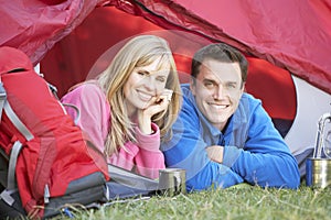 Couple Inside Tent On Camping Holiday