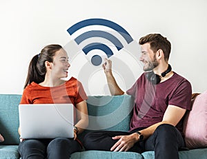 Couple with internet signal icon