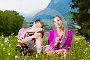 Couple with issues in Alpine meadow