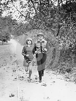 Couple jogging through the country side