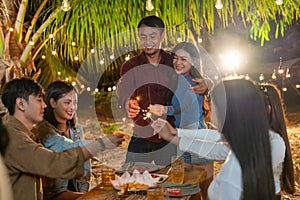 The couple joins a fun party with a group of friends