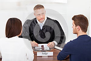 Couple with judge in court