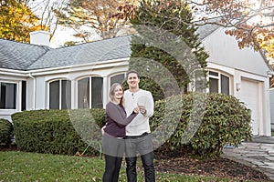 Couple with keys to new home