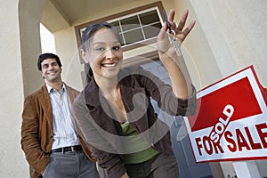 Couple With Keys To New Home