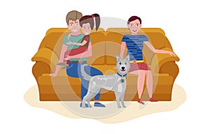 Couple with kid and dog sitting on sofa. Calm evening pastime concept