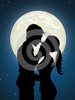 Couple kisses in the moonlight