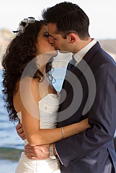 Couple kissin during wedding dance