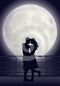 Couple kissing in moonlight