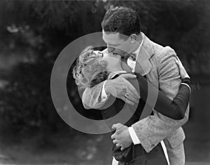 Couple kissing passionately photo