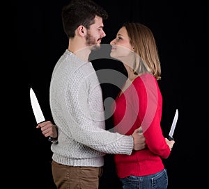 Couple with knives