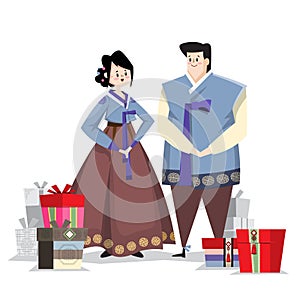 Couple in Korean traditional costume with holiday gifts