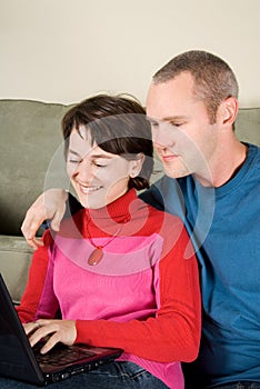 Couple on laptop photo